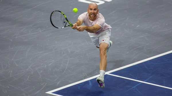 Аdrian Mannarino FRA stretches for a backhand during the first round of the Dallas Open on February 3, 2025, at Ford Center at The Star in Frisco, TX.
