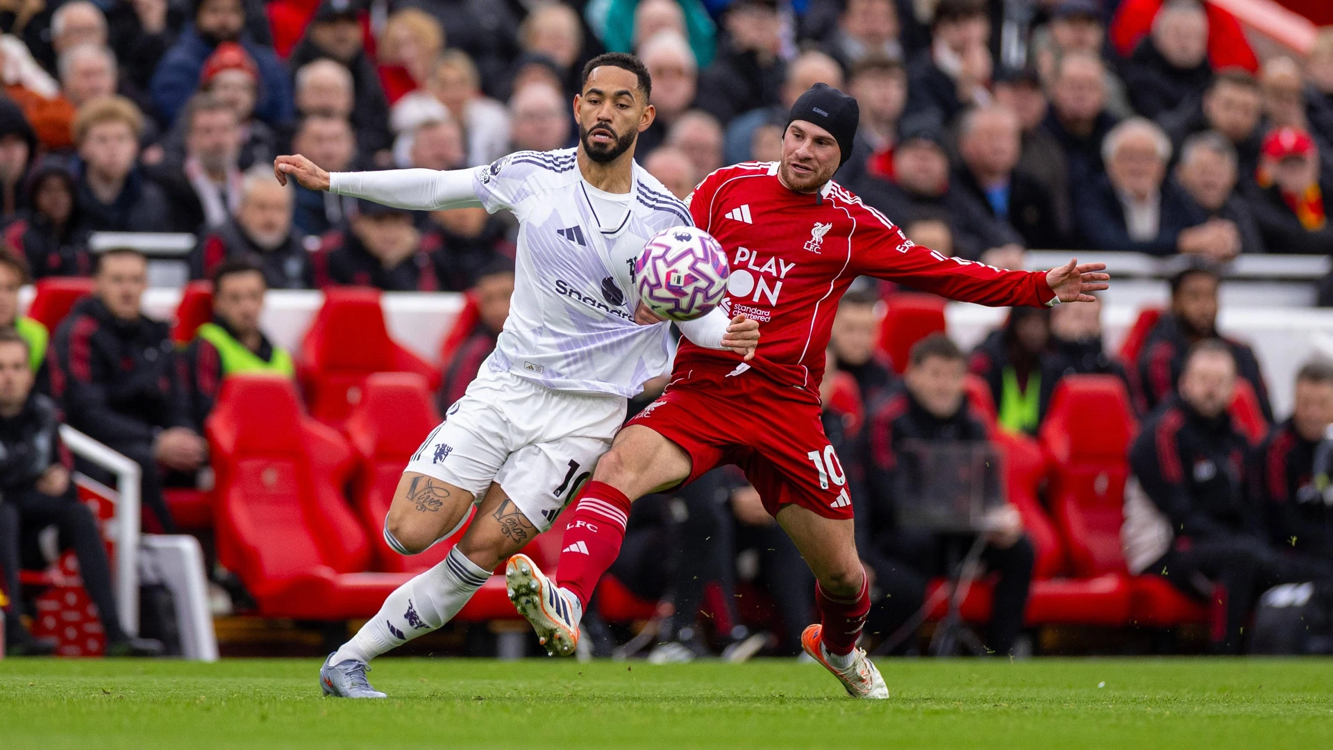 October 19, 2025: Liverpool s Alexis Mac Allister is challenged by Manchester United s Matheus Cunha R during the FA Premier League match between Liverpool FC and Manchester United FC at Anfield.
