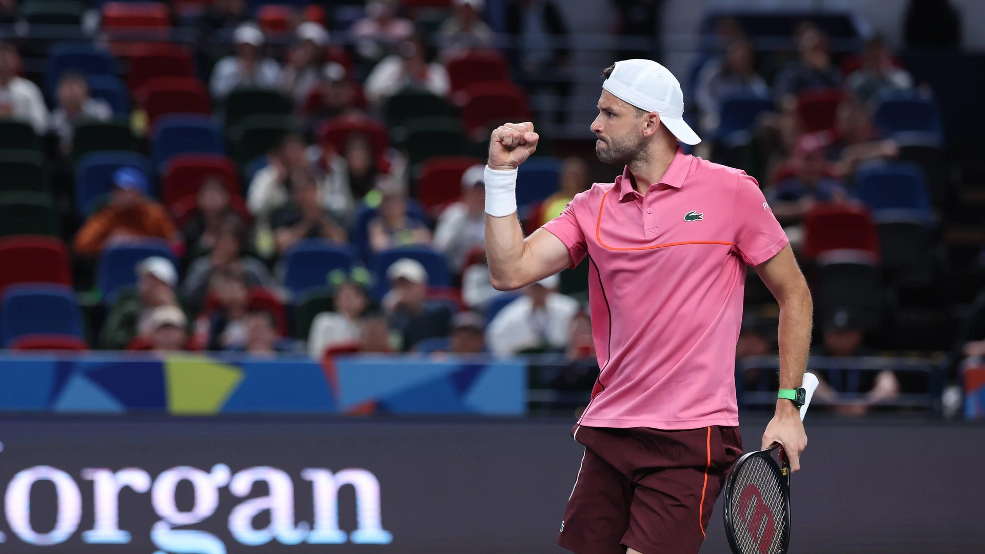 Grigor Dimitrov of Bulgaria celebrates after winning the men s singles round of 64 match against Zizou Bergs of Belgium at the ATP, World Tour Shanghai Masters