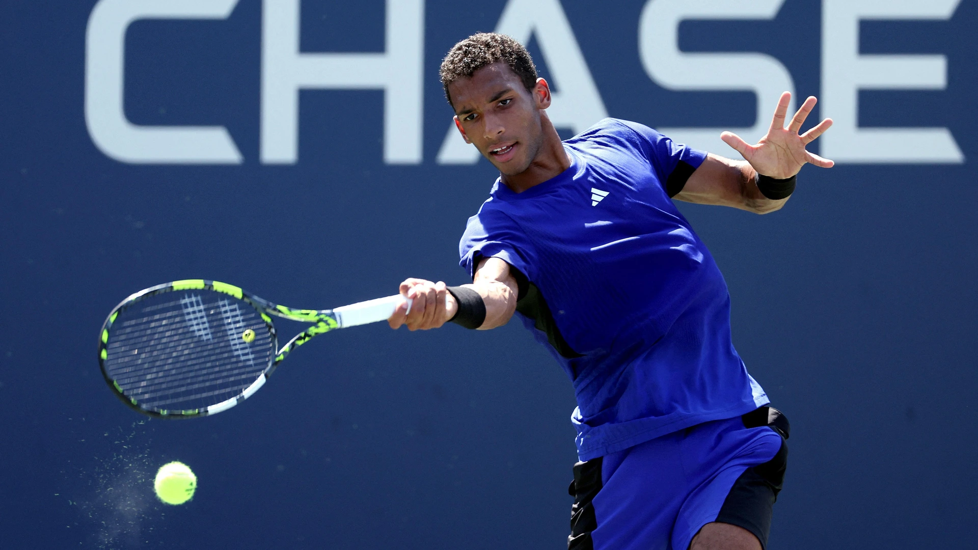 NEW YORK, NEW YORK - AUGUST 27: Felix Auger-Aliassime of Canada returns against Jakub Mensik of the Czech Republic during their Men's Singles First Round match on Day Two of the 2024 US Open on August 27, 2024 in New York City.