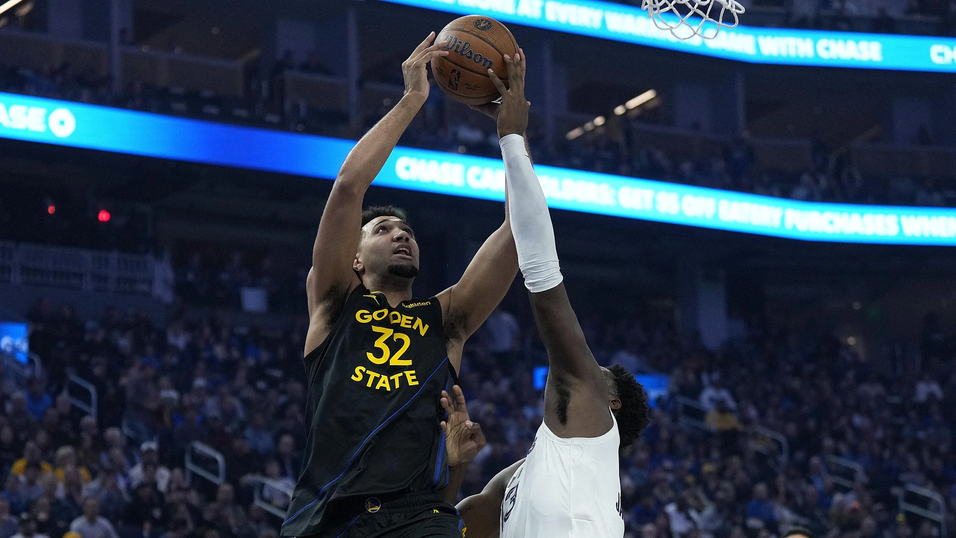 aren Jackson Jr. #13 of the Memphis Grizzlies blocks the shot of Trayce Jackson-Davis #32 of the Golden State Warriors in the first quarter during the Emirates NBA Cup game at Chase Center on November 15, 2024 in San Francisco, California.