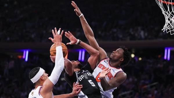 NEW YORK, NEW YORK - JUNE 08: Stephon Castle #5 of the San Antonio Spurs drives to the rim as Og Anunoby #8 and Josh Hart #3 of the New York Knicks defend during the second quarter in Game Three of the 2026 NBA Finals at Madison Square Garden on June 08, 2026 in New York City.