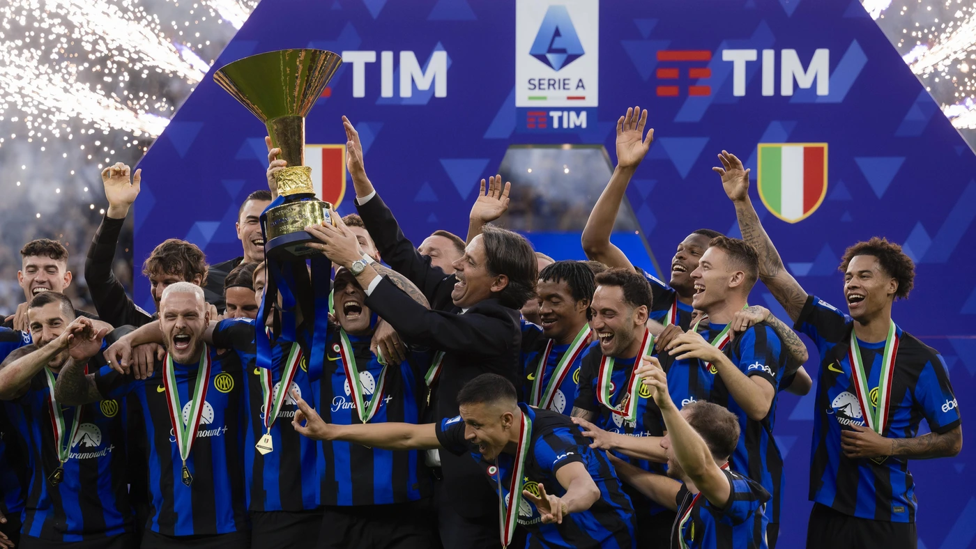 Serie A Lautaro Martinez of FC Internazionale (Inter) lifts the Scudetto trophy as teammates celebrate during the award ceremony at the end of the Serie A football match between FC Internazionale and SS Lazio.