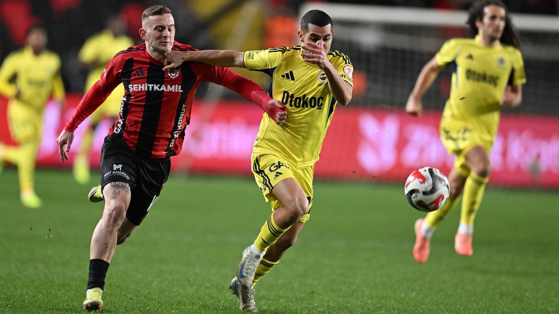 Levent Mercan R of Gaziantep FK in action against Kozlowski L during the Turkish Cup Group C Week 4 match between Gaziantep FK and Fenerbahce at Gaziantep Metropolitan Stadium in Gaziantep, Turkiye, on March 04, 2026.