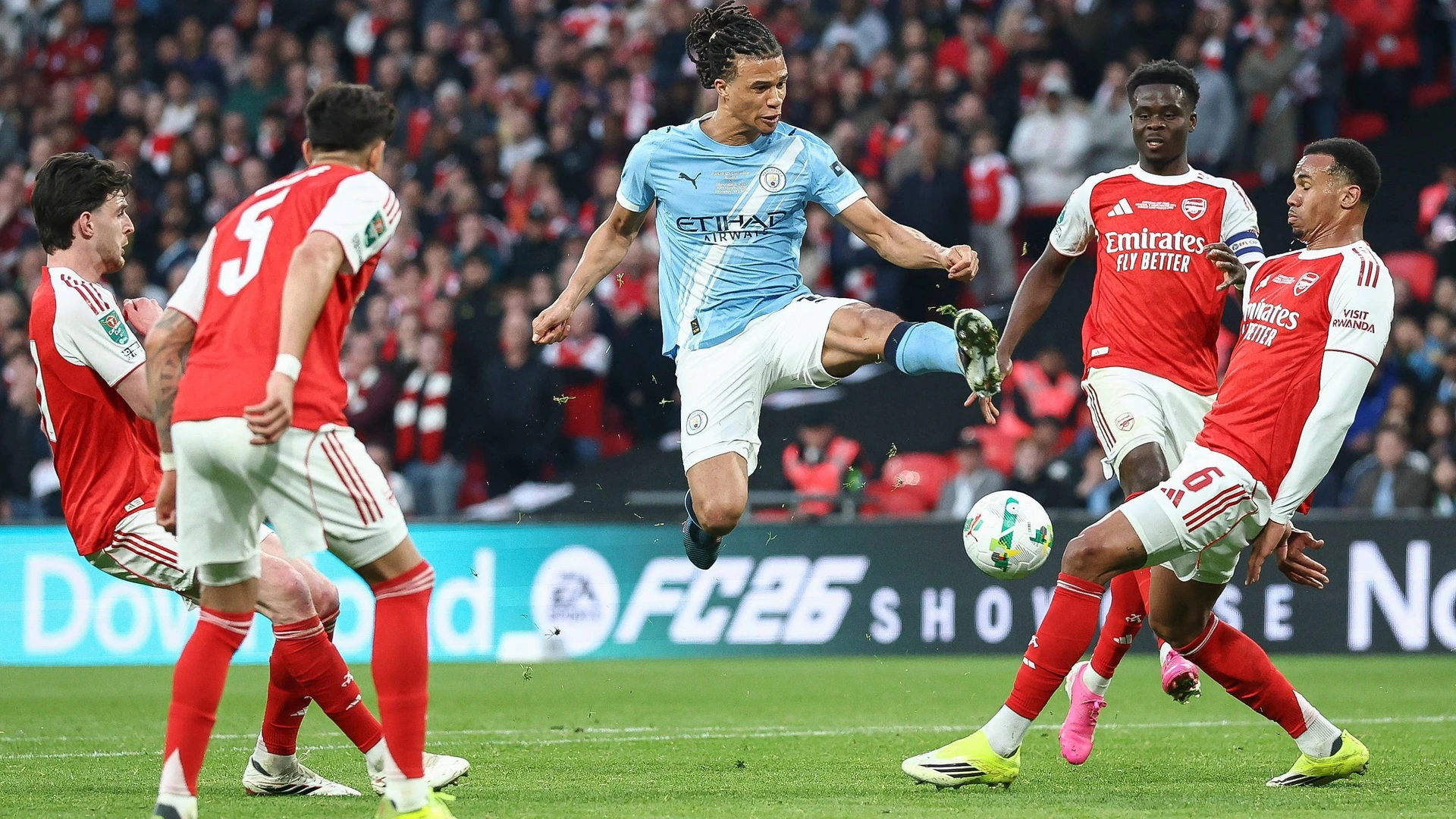 Arsenal v Manchester City, Carabao Cup Final Nathan Ake of Manchester City shoots at goal, blocked by Gabriel Magalhaes of Arsenal during the Arsenal v Manchester City Carabao Cup Final match at Wembley Stadium, London, England on 22 March 2026