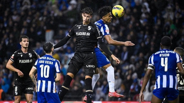 FC Porto's Portuguese forward #70 Goncalo Borges (C) heads the ball challenged by Vitoria Guimaraes' Portuguese defender #04 Felipe Relvas during the Portuguese League football match between FC Porto and Vitoria de Guimaraes February 24, 2025.