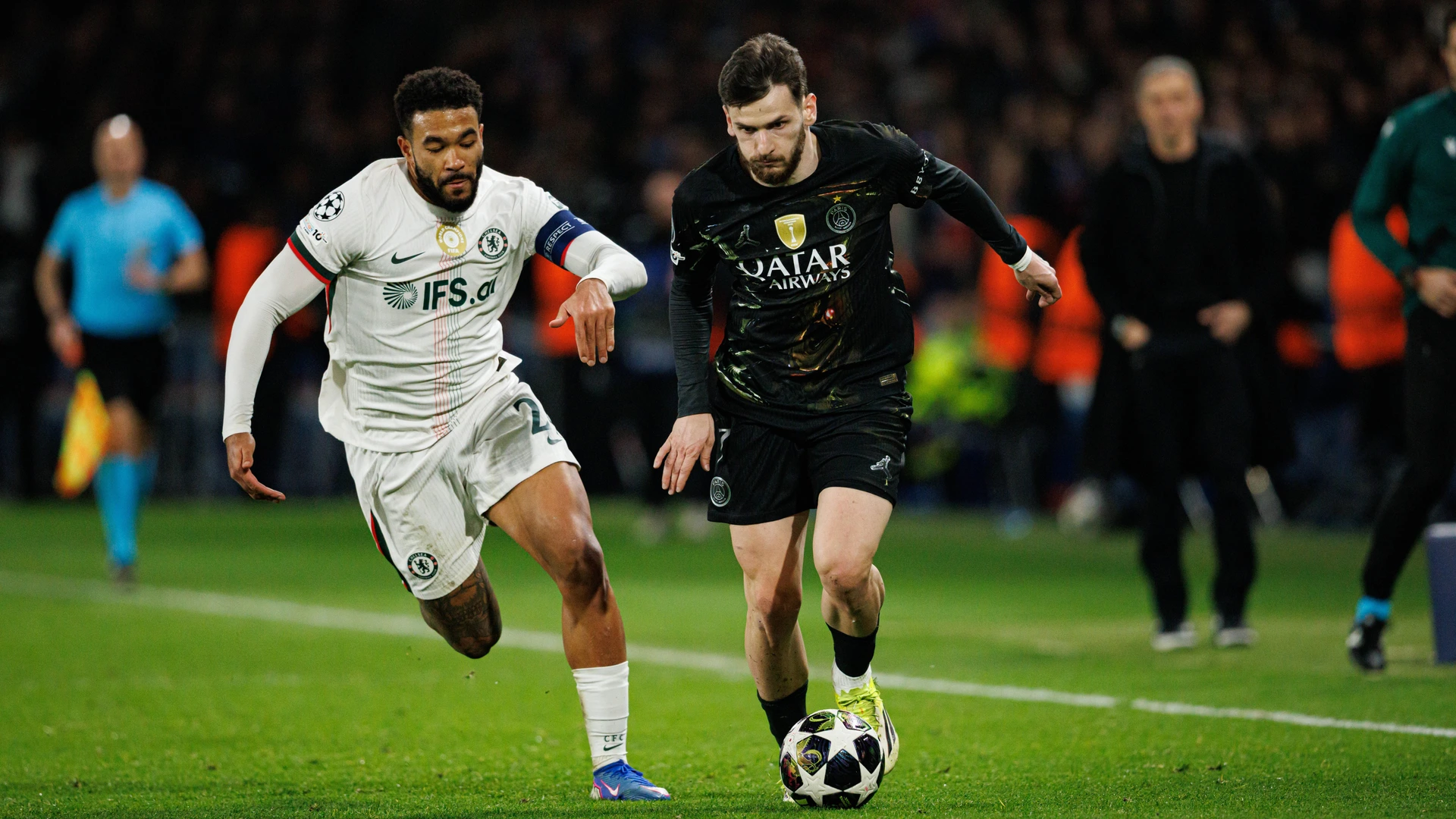 Reece James and Khvicha Kvaratskhelia seen during Champions League Round of 16 game between teams of Paris Saint-Germain Football Club and Chelsea FC