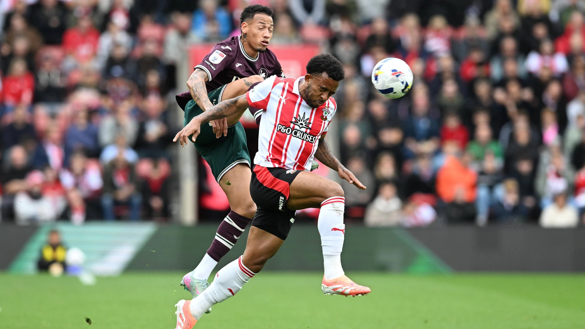 Shea Charles 24 of Southampton on the attack battles for possession with Ronald 35 of Swansea City during the EFL Sky Bet Championship match between Southampton and Swansea City at the St Mary s Stadium, Southampton, England on 18 October 2025.