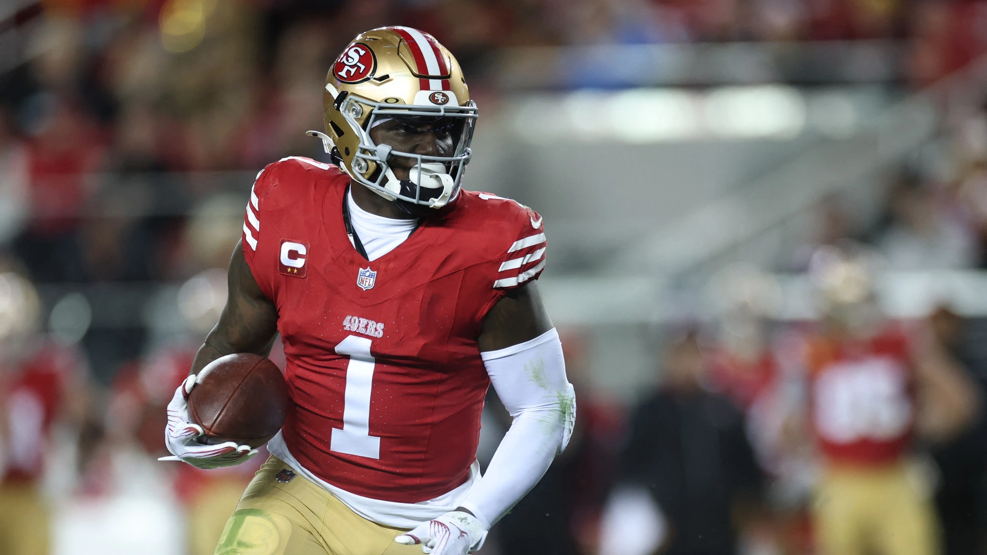 Deebo Samuel Sr. #1 of the San Francisco 49ers carries the ball and scores a touchdown against the Detroit Lions during the third quarter at Levi's Stadium on December 30, 2024
