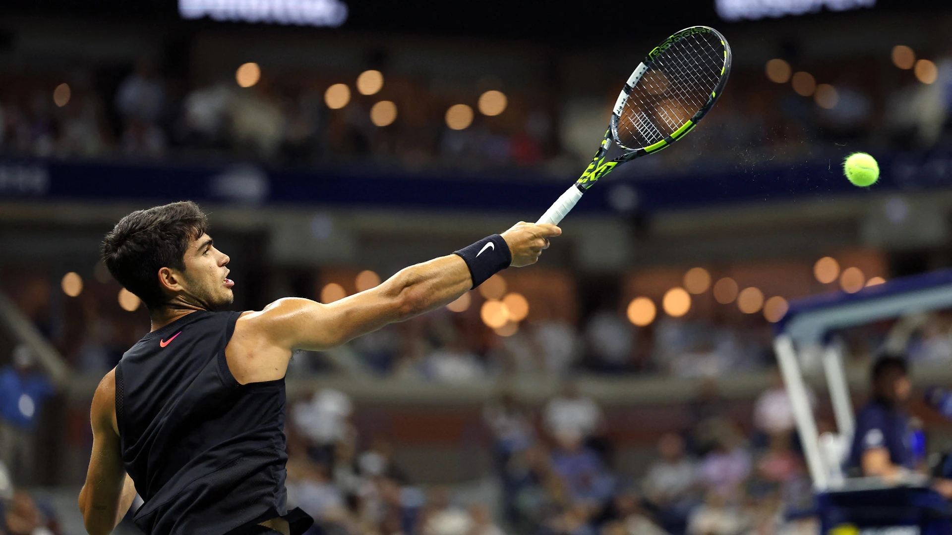 Spain's Carlos Alcaraz plays a forehand return against Netherlands' Botic van De Zandschulp during their men's singles match on day four of the US Open tennis tournament in New York City, on August 29, 2024.