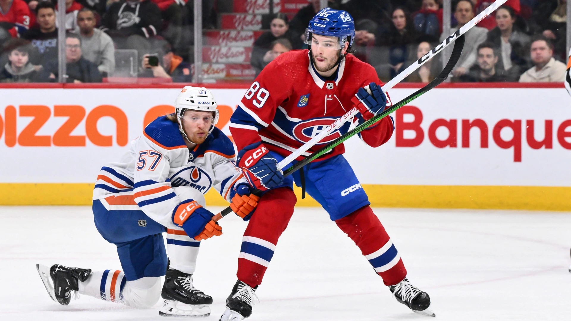 MONTREAL, CANADA - JANUARY 13: Joshua Roy #89 of the Montreal Canadiens skates in his first career NHL game against James Hamblin #57 of the Edmonton Oilers during the second period at the Bell Centre on January 13, 2024 in Montreal, Quebec, Canada.