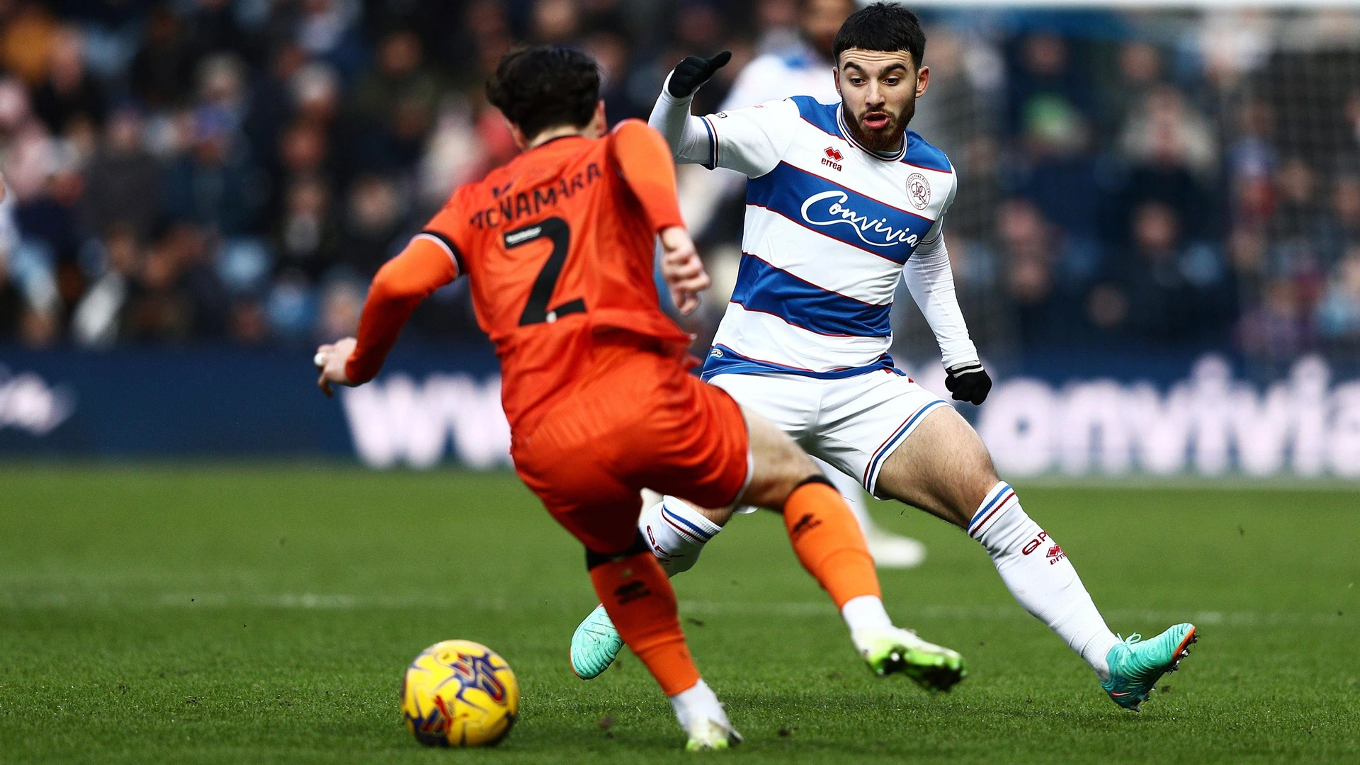 Dan McNamara of Millwall on the ball whilst under pressure from Ilias Chair of QPR during the Sky Bet EFL Championship match between Queens Park Rangers and Millwall on Saturday 20th January 2024