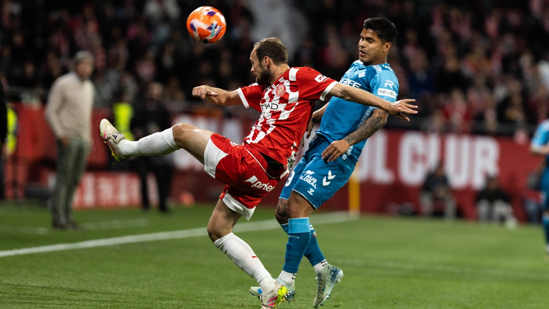 Daley Blind L of Girona FC and Cucho Hernandez R of Real Betis seen in action during the 2024-25 LaLiga EA Sports season in 32 matchday between Girona FC and Real Betis at Estadi Montilivi. Final score Girona FC 1:3 Real Betis