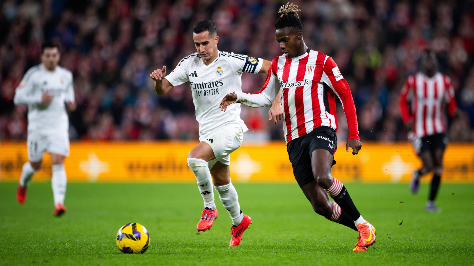 Athletic Club vs Real Madrid CF - La Liga EA Sports - 04/12/2024 Lucas Vazquez of Real Madrid CF L and Nico Williams of Athletic Club