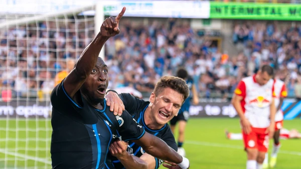 Carlos Forbs of Club Brugge celebrates after scoring the second goal with Christos Tzolis of Club Brugge during the UEFA Champions League Third Qualifying Round Second Leg match between Club Brugge and RB Salzburg at Jan Breydel Stadium on August 12, 2025
