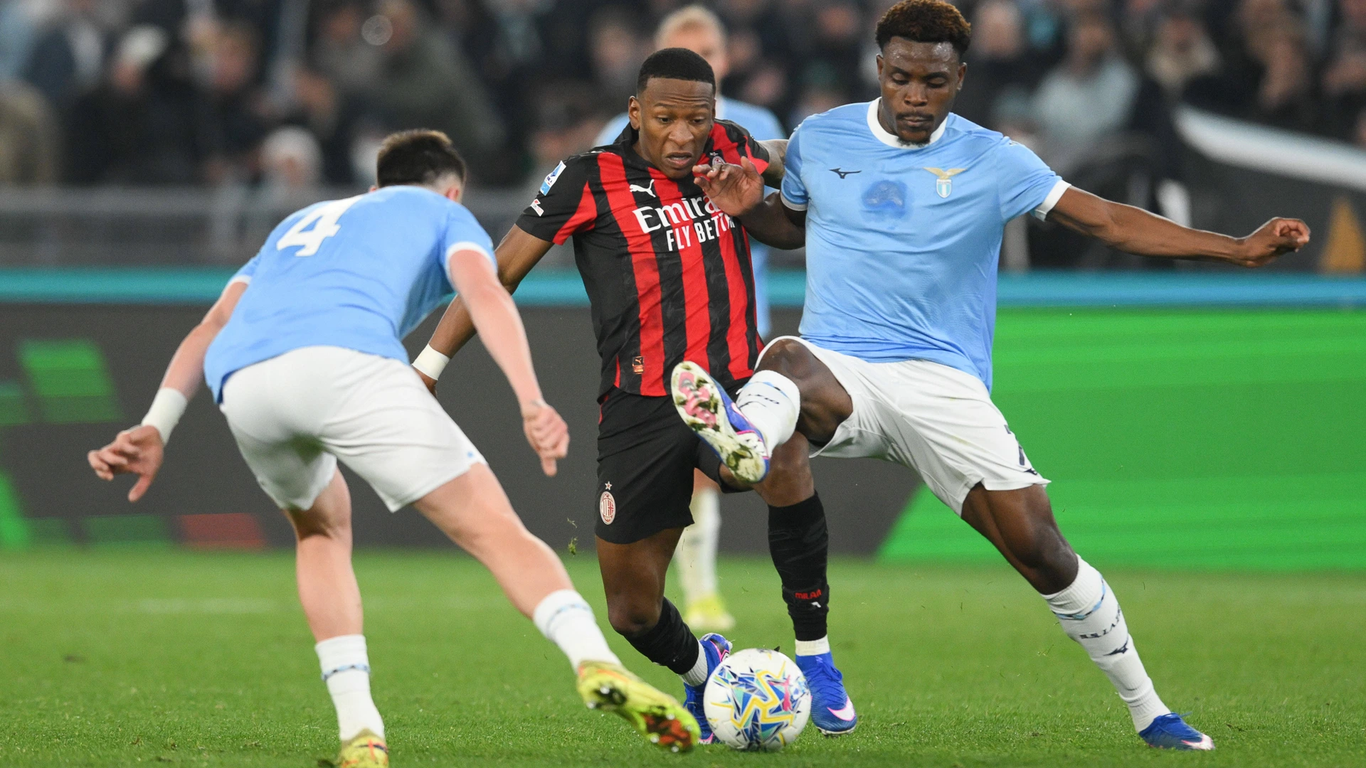 5 Mar 2026 Olimpico Stadium, Rome, Italy Serie A Eni Football Match SS Lazio versus AC Milan Pervis Estupinan of AC Milan under pressure from Fisayo Dele-Bashiru of SS Lazio