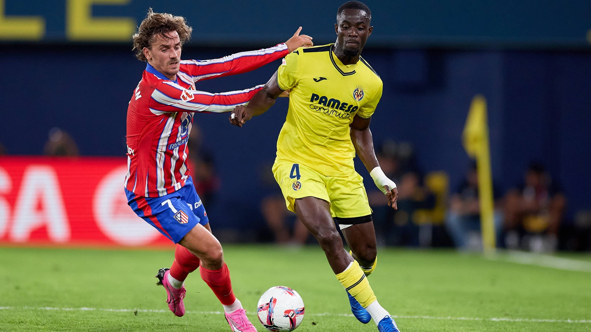 Eric Bailly of Villarreal CF is in action with Antoine Griezmann of Atletico de Madrid during the La Liga match between Villarreal CF and Club Atletico de Madrid in Villarreal, Spain, on August 19, 2024