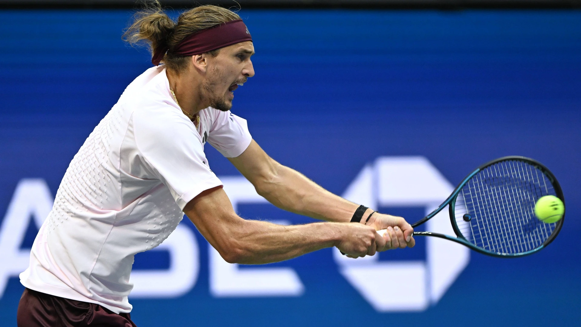 Alexander Zverev returns a shot during the men s semifinal match between Alexander Zverev of Germany and Karen Khachanov of Russia at the 2026 US Open tennis championships in New York, the United States, Sept. 11, 2026.