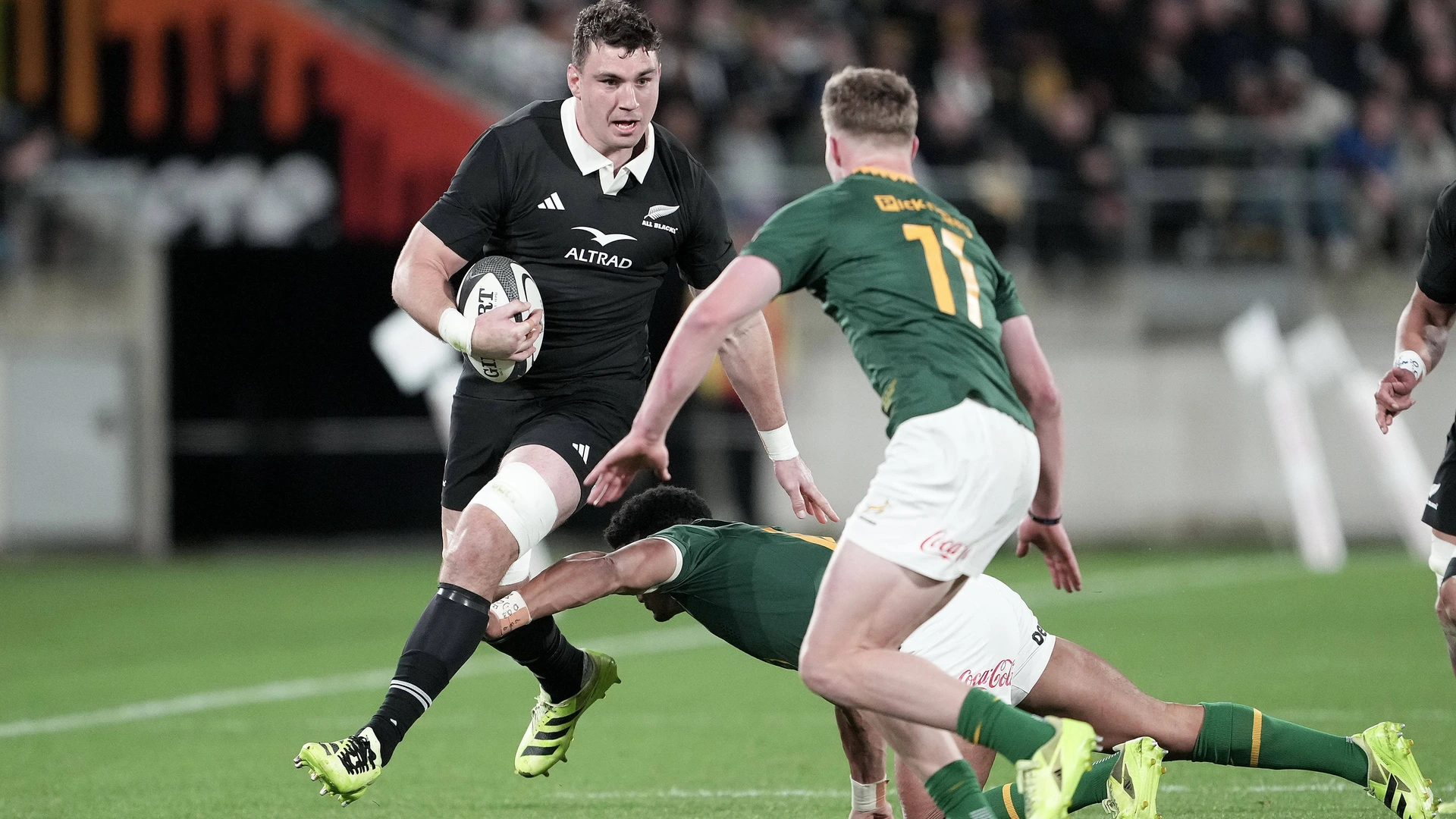 All Blacks Simon Parker L is tackled by South Africa Ethan Hooker R and Sacha Feinberg-Mngomezulu during the Rugby Championship - New Zealand All Blacks v South Africa test match at Sky Stadium, Wellington. 13 September 2025