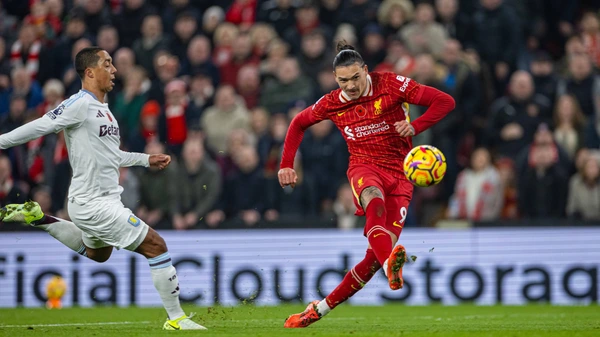 Football - FA Premier League - Liverpool FC v Aston Villa FC LIVERPOOL, ENGLAND - Saturday, November 9, 2024: Liverpool s Darwin Nunez shoots during the FA Premier League match between Liverpool FC and Aston Villa FC at Anfield.