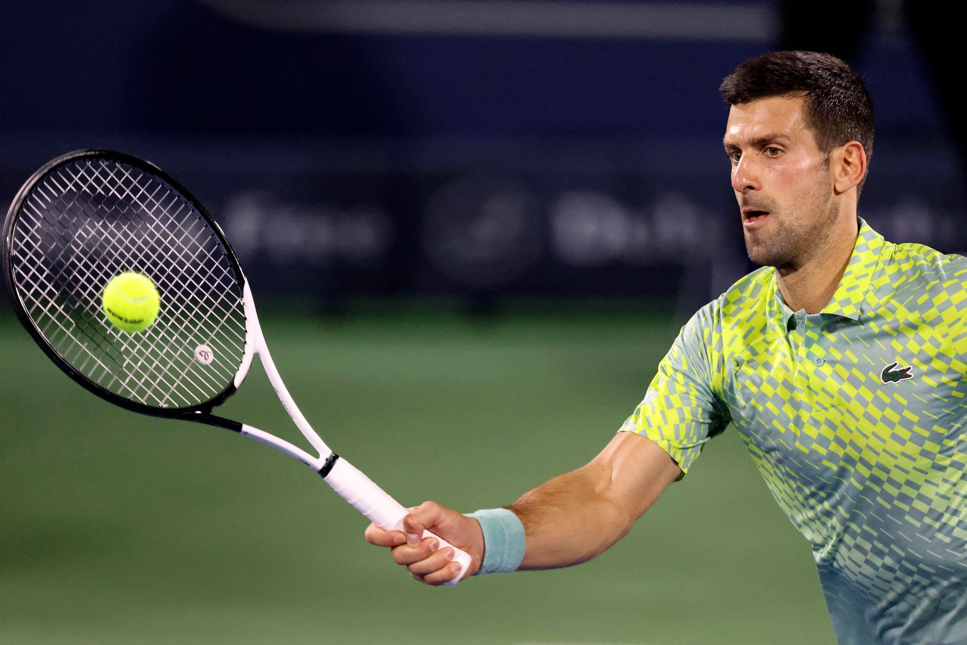 Serbia's Novak Djokovic returns the ball to Czech Republic's Tomas Machac (not pictured) during their Dubai Duty Free Tennis Championship match in Dubai on February 28, 2023.