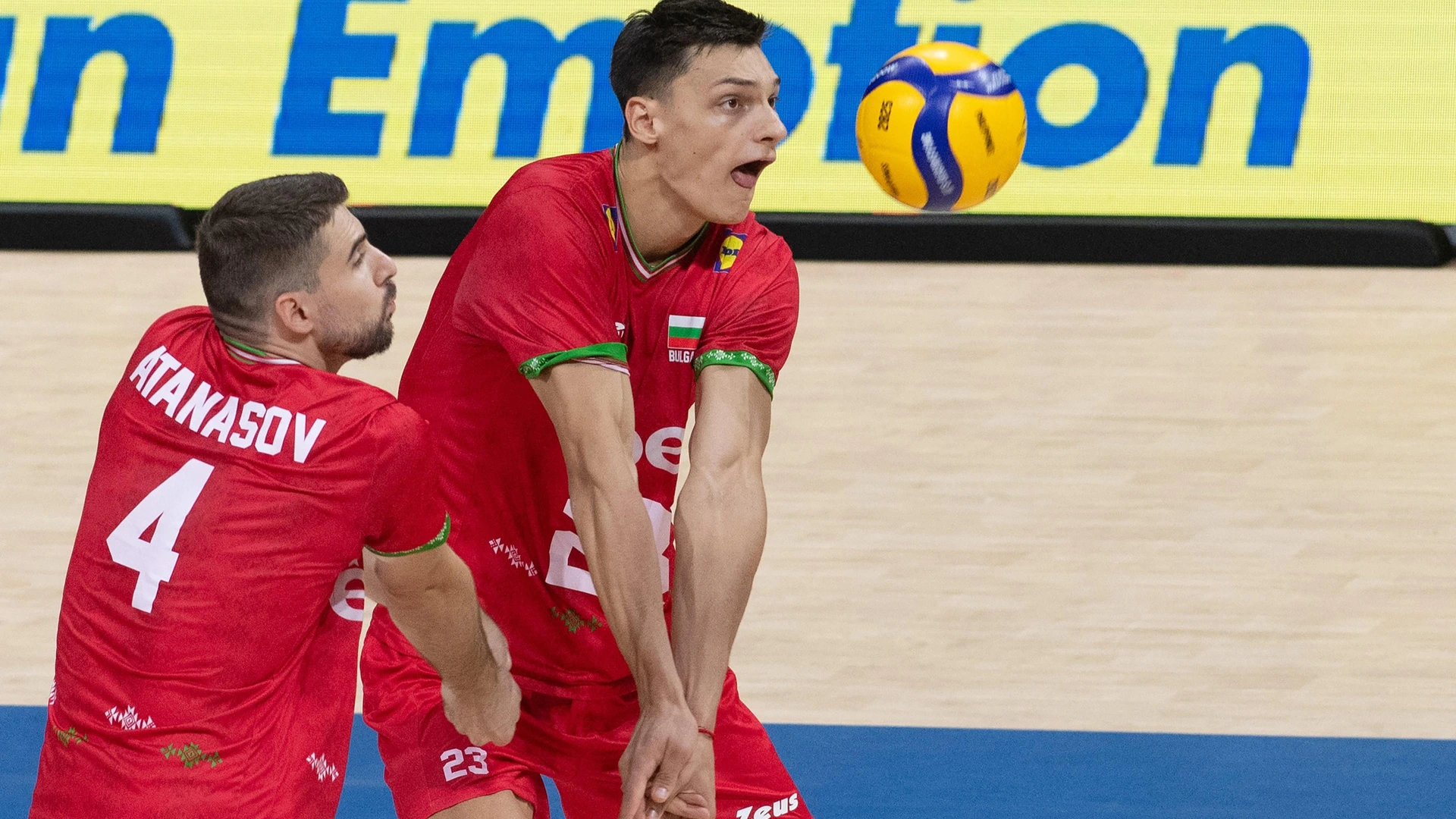 Bulgaria's Martin Atanasov (L) and Aleksandar Nikolov hit a return against Slovenia during their match at the Volleyball Men's World Championship in Manila on September 15, 2025.
