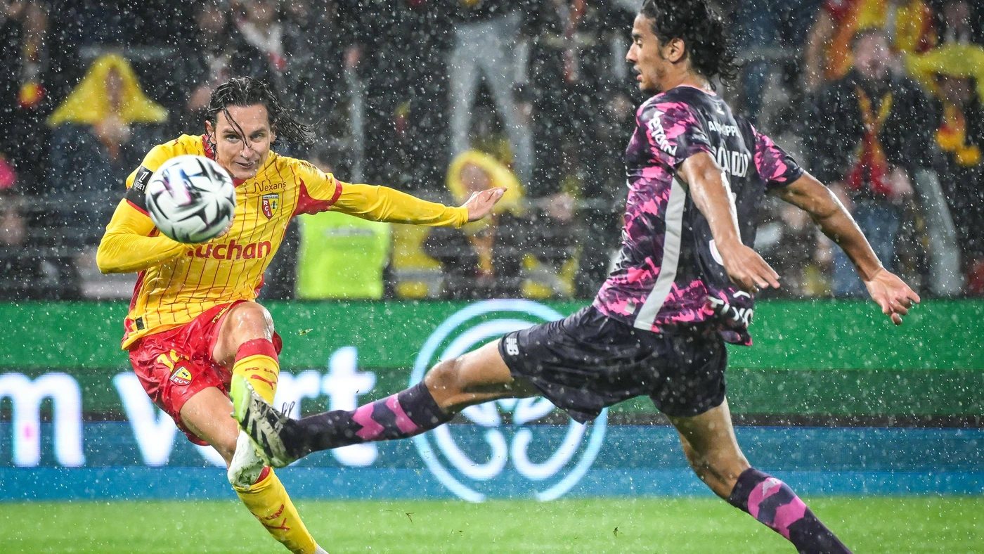 September 20, 2025, Lens, France, France: Florian THAUVIN of Lens and Ayyoub BOUADDI of Lille during the Ligue 1 match between RC Lens and Lille OSC LOSC at Bollaert-Delelis Stadium on September 20, 2025 in Lens, France.