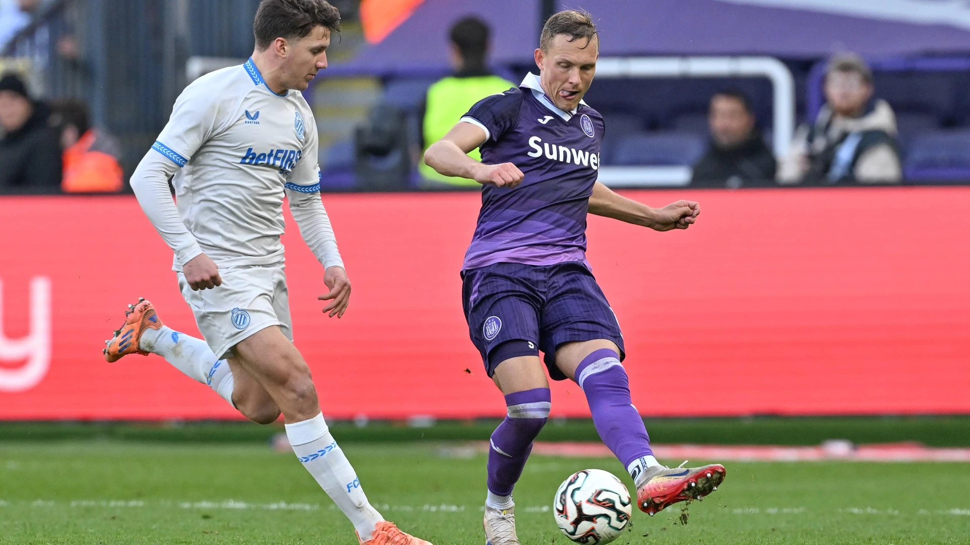 251109 RSC Anderlecht vs Club Brugge Christos Tzolis 8 of Club Brugge and Ludwig Augustinsson 6 of Anderlecht pictured during the Jupiler Pro League season 2025 - 2026 matchday 14 game between RSC Anderlecht and Club Brugge KV on November 9 , 2025
