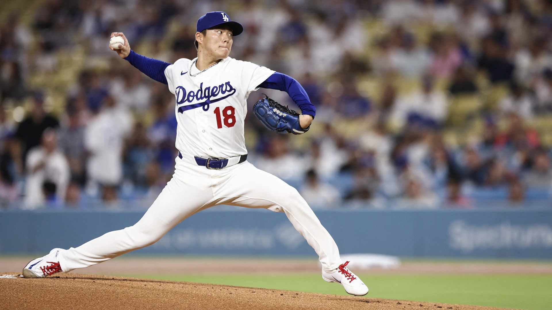 Yoshinobu Yamamoto #18 of the Los Angeles Dodgers pitches in the first inning against the San Diego Padres at Dodger Stadium on September 23, 2026 in Los Angeles, California.