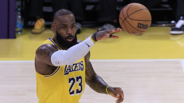 LeBron James 23 of the Los Angeles Lakers passes the ball during their regular season NBAgame against the Houston Rockets on Friday April 11, 2025