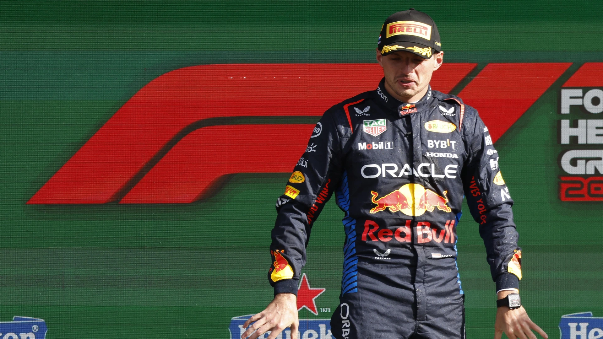 Second-placed Red Bull Racing's Dutch driver Max Verstappen celebrates during the podium ceremony after the Formula One Dutch Grand Prix at The Circuit Zandvoort, western Netherlands, on August 25, 2024.