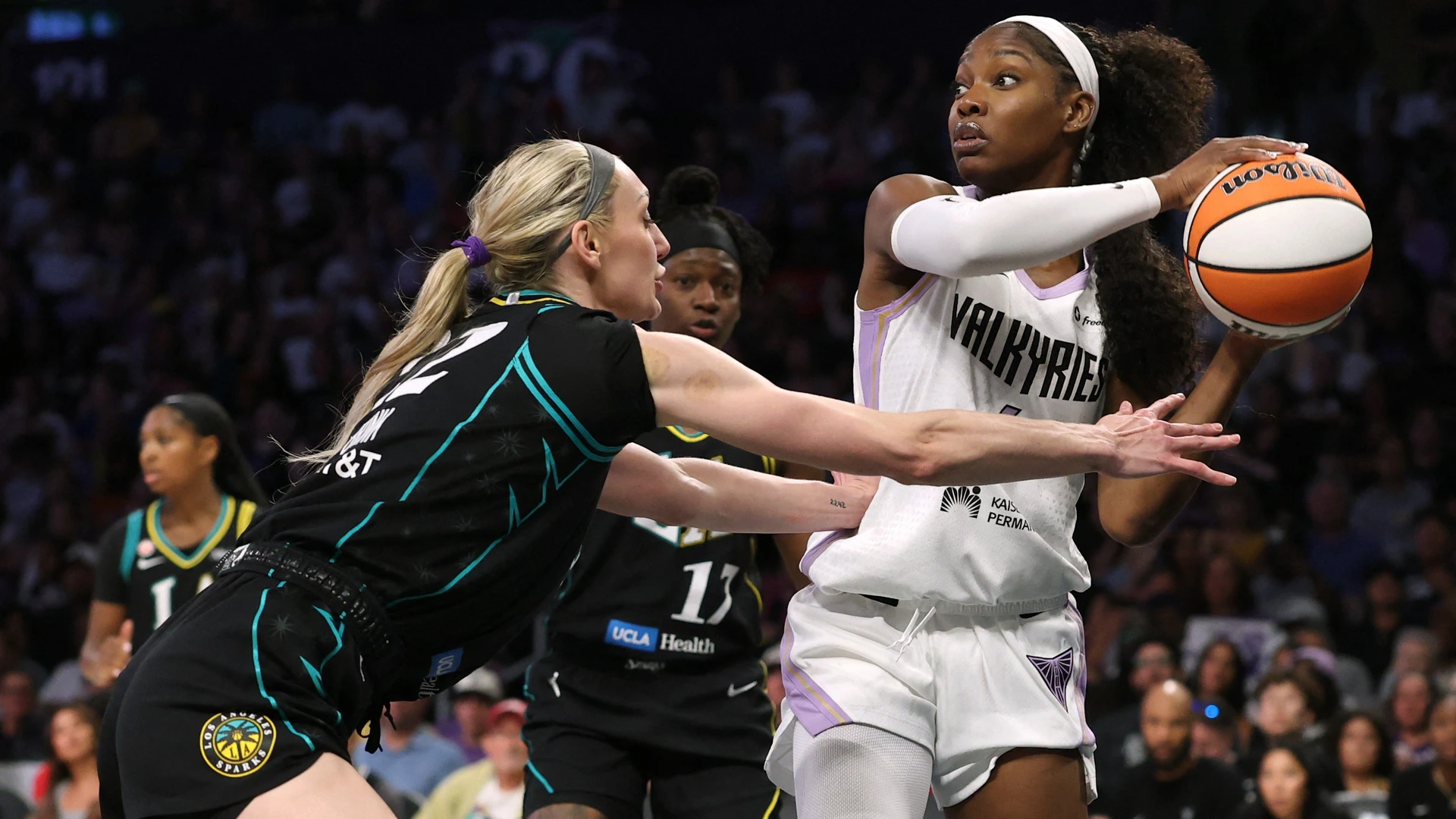Kaila Charles #6 of the Golden State Valkyries looks to pass in front of Cameron Brink #22 of the Los Angeles Sparks during a 84-78 Golden State Valkyries win at Crypto.com Arena on August 09, 2026