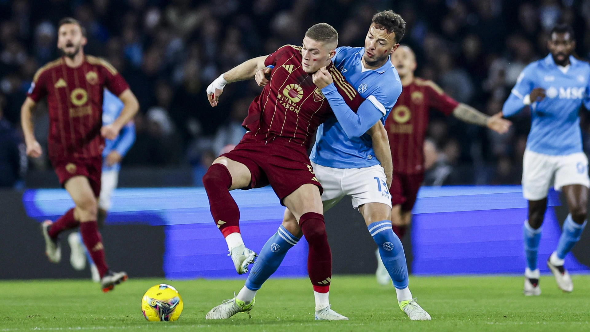 Italy: Serie a football match SSC Napoli vs AS Roma Romas Ukrainian forward Artem Dovbyk challenges for the ball with Napoli s Kosovar defender Amir Rrahmani during the Serie A football match between SSC Napoli and AS Roma November 24, 2024.