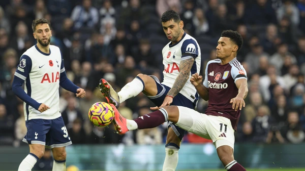 Tottenham Hotspur s Cristian Romero left battles with Aston Villa s Ollie Watkins right during the Premier League 2024/25 League match between Tottenham Hotspur FC and Aston Villa FC at Tottenham Hotspur Stadium on November 3rd, 2024