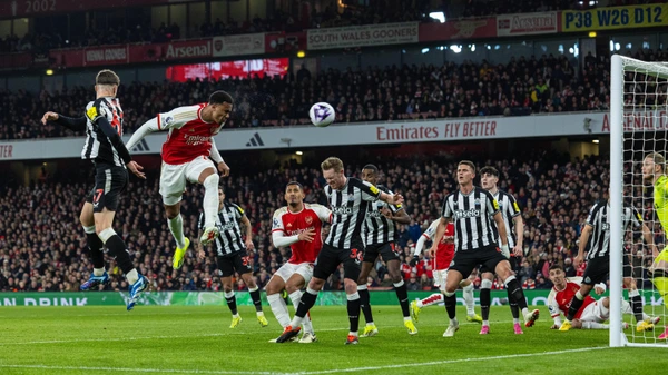 Arsenal s Gabriel Magalhaes 2nd L heads the ball to shoot during the English Premier League match between Arsenal and Newcastle United in London, Britain, Feb. 24, 2024.