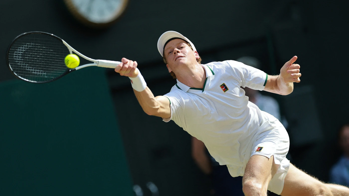 Jannik Sinner of Italy returns the ball to Novak Djokovic of Serbia during the men's singles semi-final match on day twelve of the 2026 Wimbledon Championships in London, on July 10, 2026.