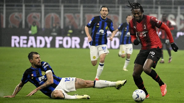 Francesco Acerbi of FC Internazionale and Rafael Leao of AC Milan compete for the ball during the Serie A football match between AC Milan and FC Internazionale at San Sirostadium stadium in Milan Italy, April 22nd, 2023.