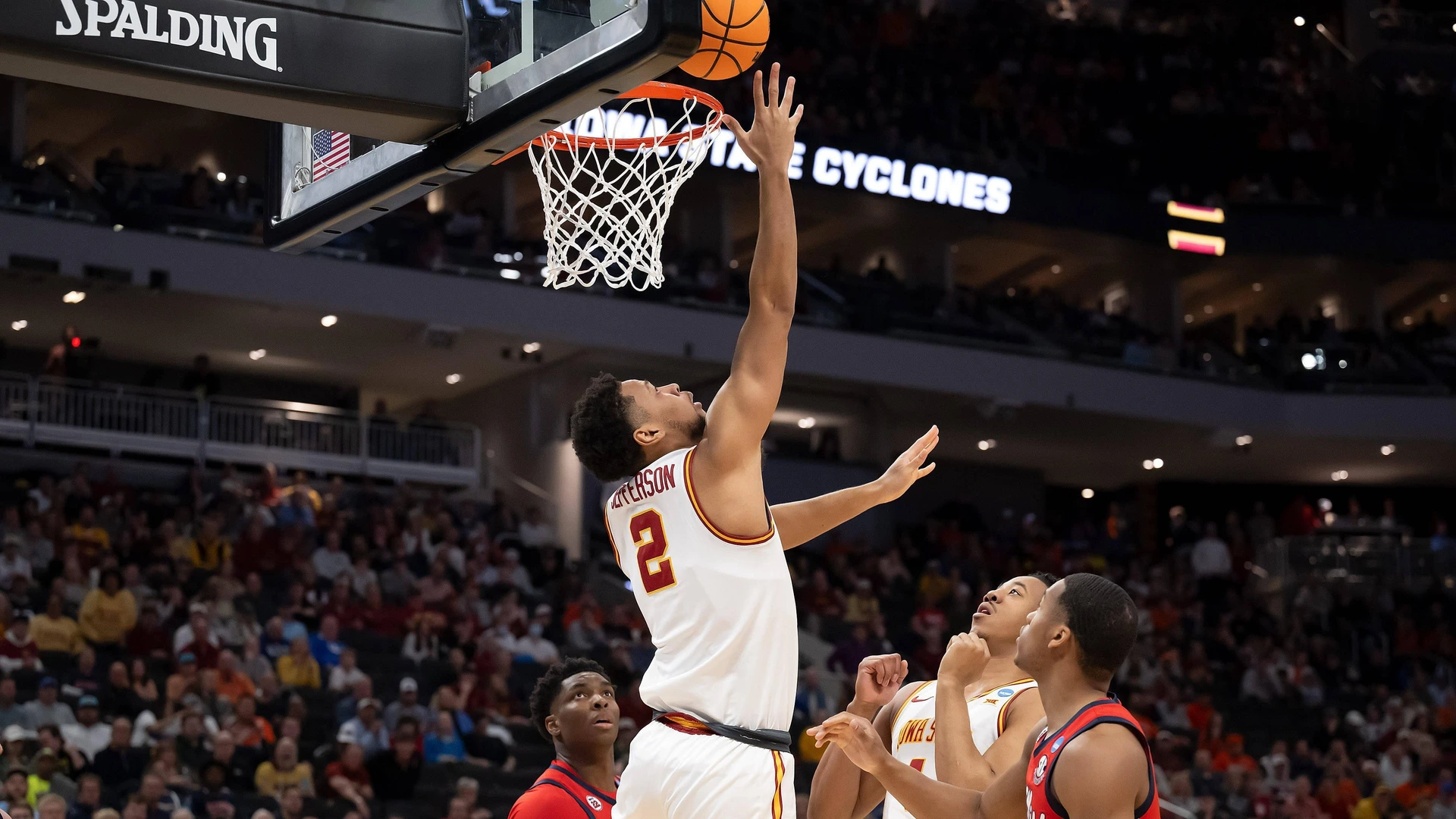 March 23, 2025: Iowa State Cyclones forward Joshua Jefferson shoots a layup in front of Iowa State forward Joshua Jefferson and Mississippi Rebels Matthew Murrell as Mississippi Rebels forward Malik Dia watches.