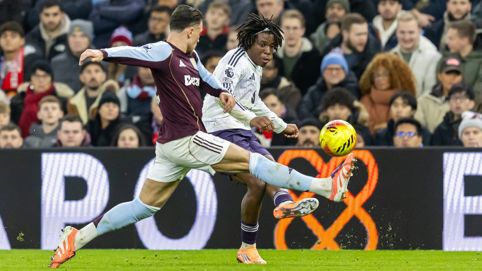 Aston Villa v Manchester United, 21/12/2025. Manchester United defender Patrick Dorgu 13 crosses the ball during the Premier League match between Aston Villa and Manchester United at Villa Park, Birmingham, England on 21 December 2025.