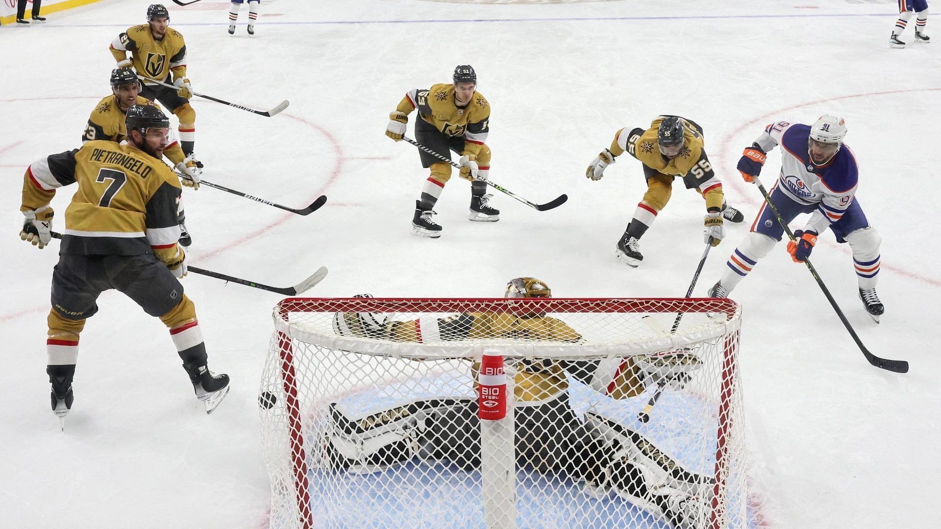 Evander Kane #91 of the Edmonton Oilers scores a goal, against Jonathan Quick #32 and Keegan Kolesar #55 of the Vegas Golden Knights on March 28, 2023 in Las Vegas, Nevada. The Oilers defeated the Golden Knights 7-4.