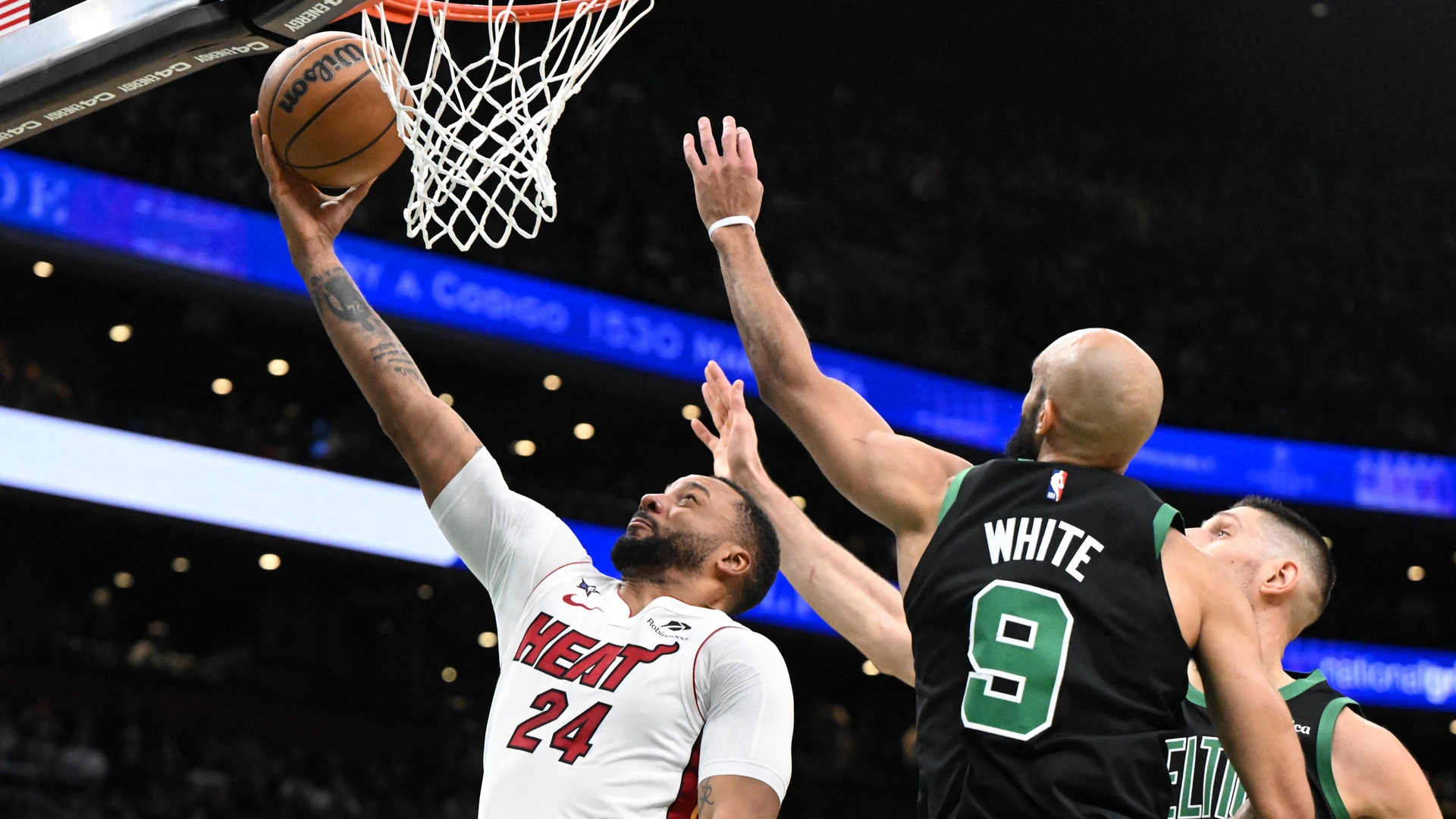 BOSTON, MASSACHUSETTS - FEBRUARY 06: Norman Powell #24 of the Miami Heat attempts a basket against the Boston Celtics during the first half at the TD Garden on February 06, 2026 in Boston, Massachusetts.